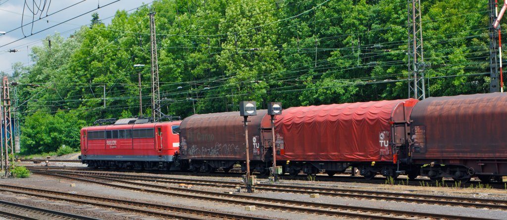 German electric locomotive 151 139-3 from the RAILION Logistics at the 28/05/2011 in Kreuztal (Germany). The locomotive have attached a freight train in the Marshalling yard and pulls is now it towards Hagen.