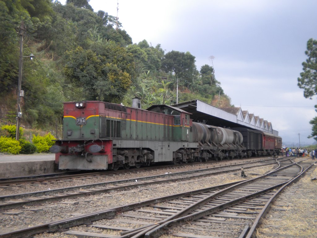 Henschel Thyssen Class M6 794 pulling a mix train arrived at Bandarawela station which is in the hill country of the island in 2012 Aug. .