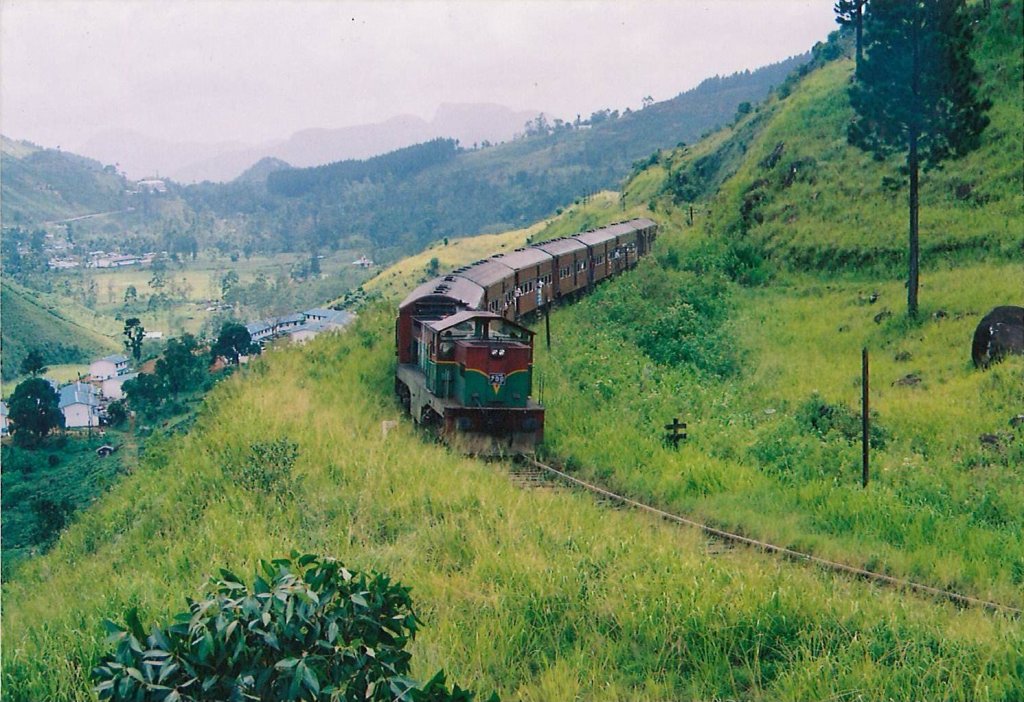 Henschel Thyssen Class M6 locomotive heading to Badulla is negotiating the S curve in Rozalla incline just before the station in Sep 2012.  