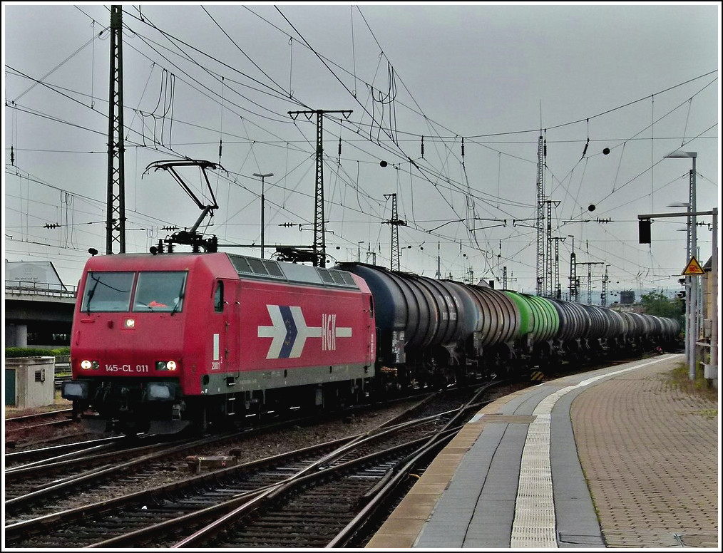 HGK 145-CL 011 is heading a freight train in Koblenz on June 25th, 2011. 