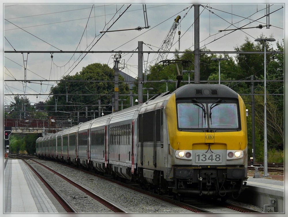 HLE 1348 is arriving with the IC A Eupen - Oostende in Welkenraedt on July 12th, 2008.