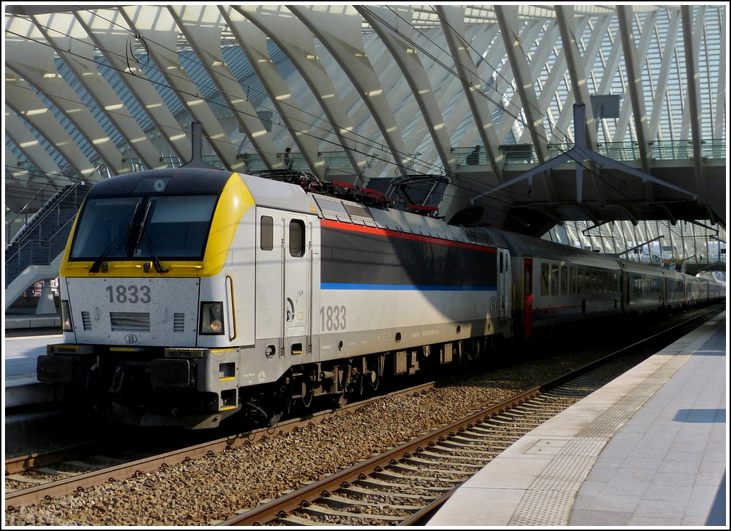 HLE 1833 is leaving the station Lige Guillemins on March 23rd, 2012.