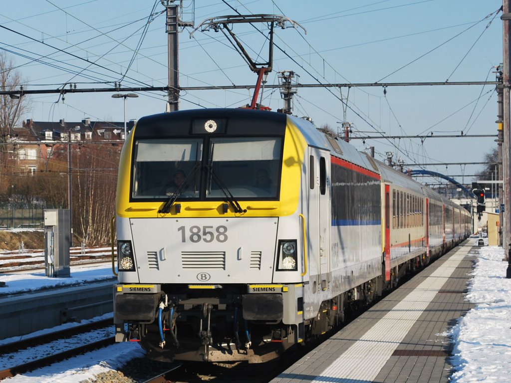 HLE 1858 hauling Intercity train Eupen-Oostende in Welkenraedt station. (Feb 2012).