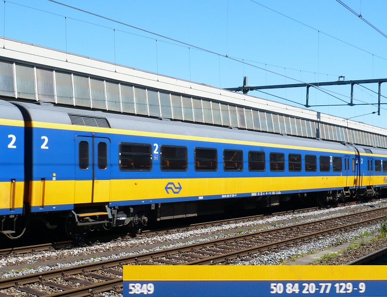 Intercity coach second class in an Intercity train from Den Haag to Venlo. Rotterdam Centraal Station 02-06-2010. 