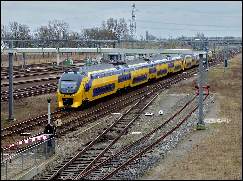 IRM Regiorunner double unit is running through the station of Lage Zwaluwe on March 10th, 2011.