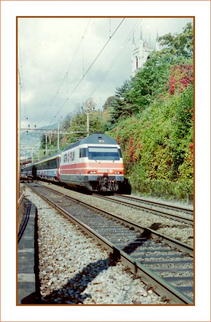 It's photo time - the SBB AGFA-lok is coming; Re 460 015-1 by Vevey in late summer 1996(scanned negative).