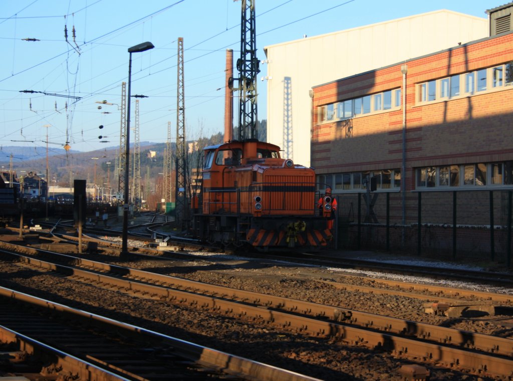 Locomotive No. 4 of the German steel works (DEW), formerly Edelstahlwerke Sdwestfalen, pulls loaded wagons on the factory rails on 29.01.2011 in Siegen-Geisweid. The locomotive is a MAK G 500 C,  built in 1975, Factory number 500 072, design type C-dh.