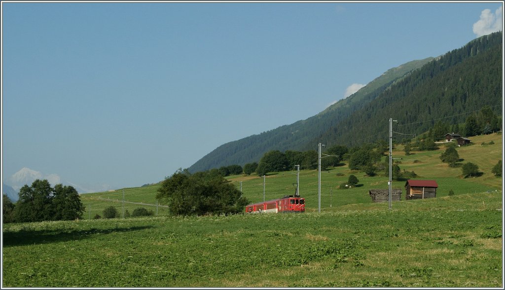 MGB local Train 519 from Andermatt to Visp just after Mnster (Goms). 05.08.2013