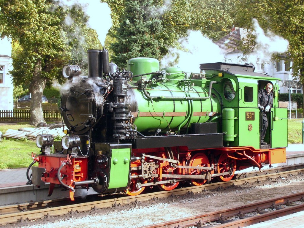 Mh Steam Locomotive 53 ,( 99 4633-6 ) in green livery , is on the island of Rgen in use.
Here seen on 10/7/2012 in Binz train station.
Built in 1925 , manufacturer Vulcan-Stettin , gauge 750 mm , power about 250 hp