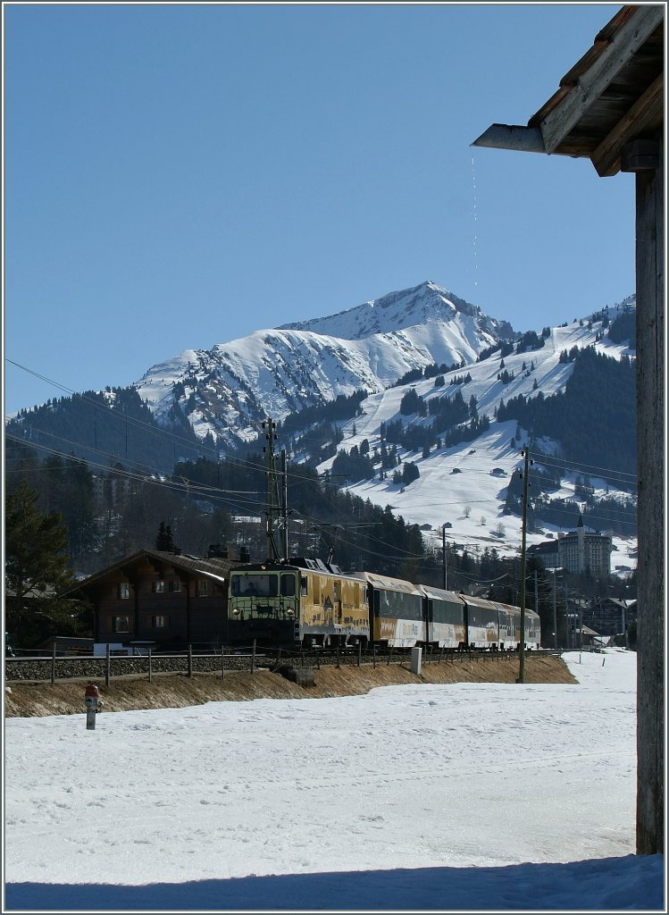 MOB GDe 4/4 with a Golden Pass Panoramic Express by Gstaad.
13. 03.2012