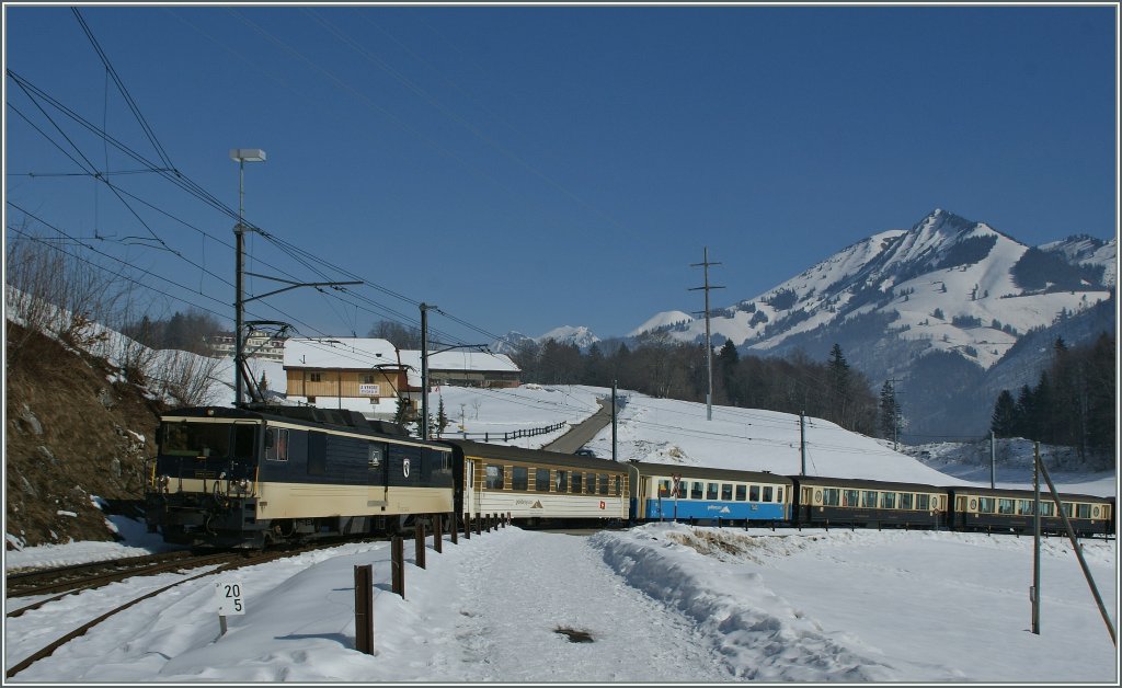MOB GDe 4/4 with a Classic Goldenpass Express is approaching Les Sciernes. 26.02.2013