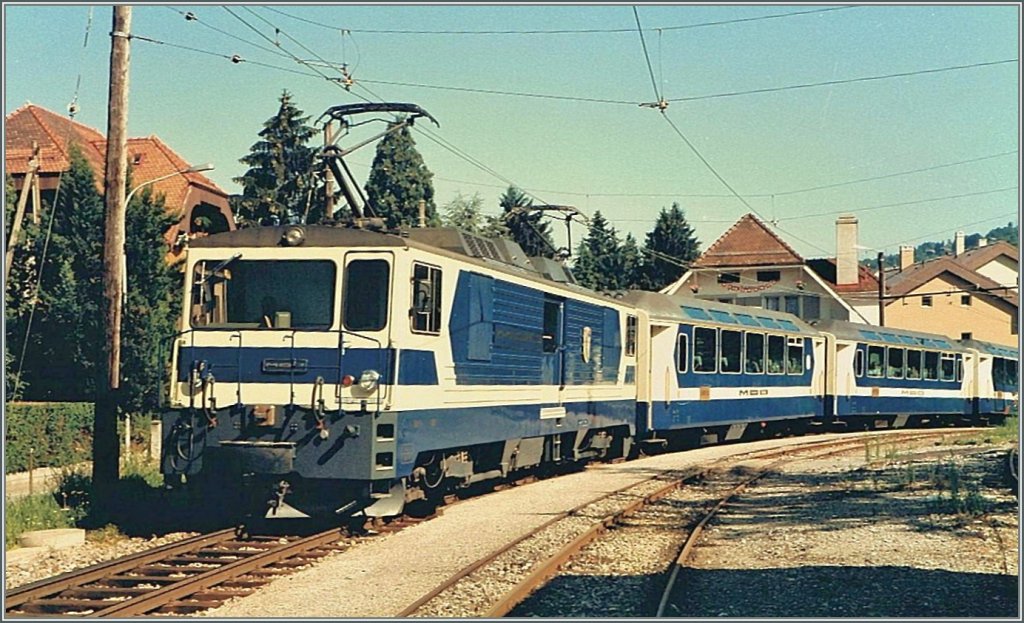 MOB GDe 4/4 with a Panoramic Express by Fontanivent. 
(Summer 1985/scanned Picture)