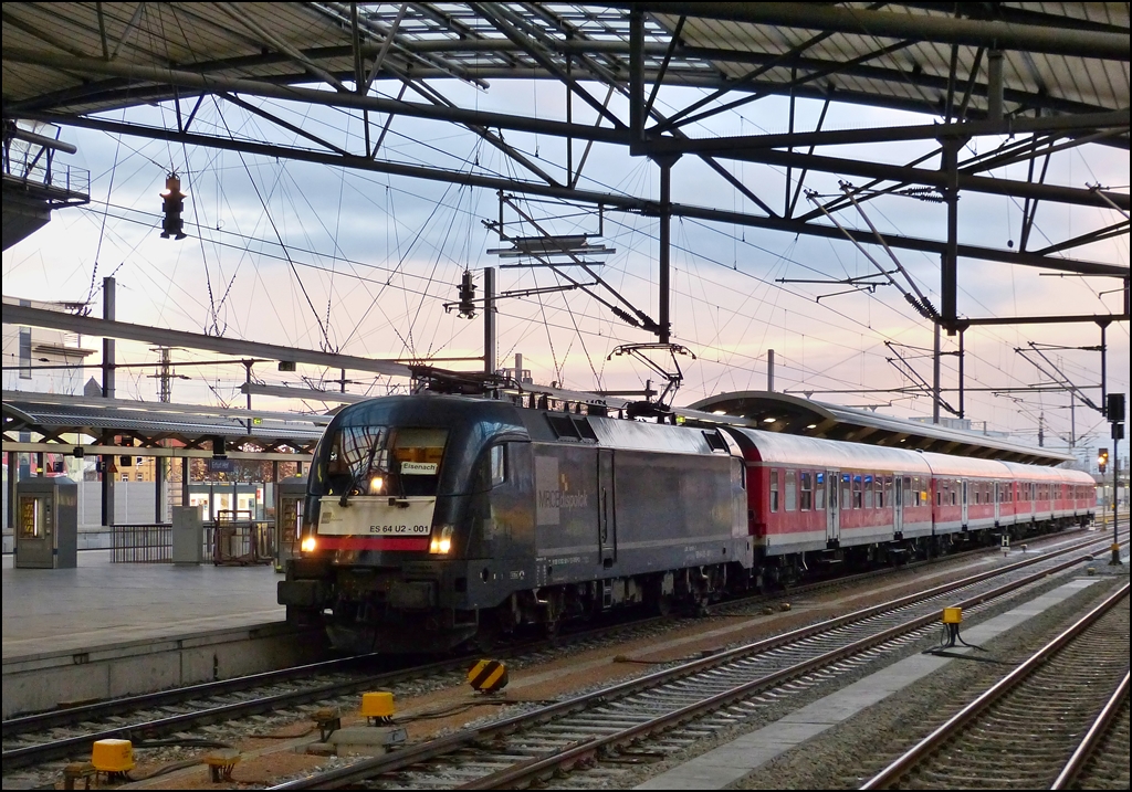 MRCE ES 64 U2 - 001 is hauling a local train into the main station of Erfurt on December 26th, 2012.