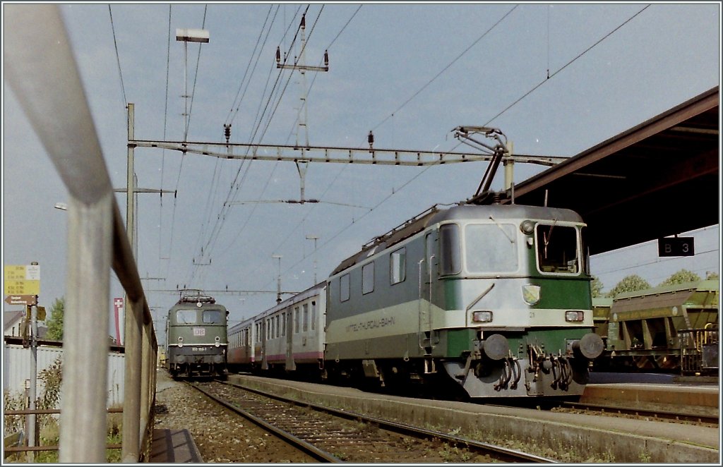 MThB Re 4/4 III in Weinfelden. In the background a DB 150. 
26.09.1996/scanned negative