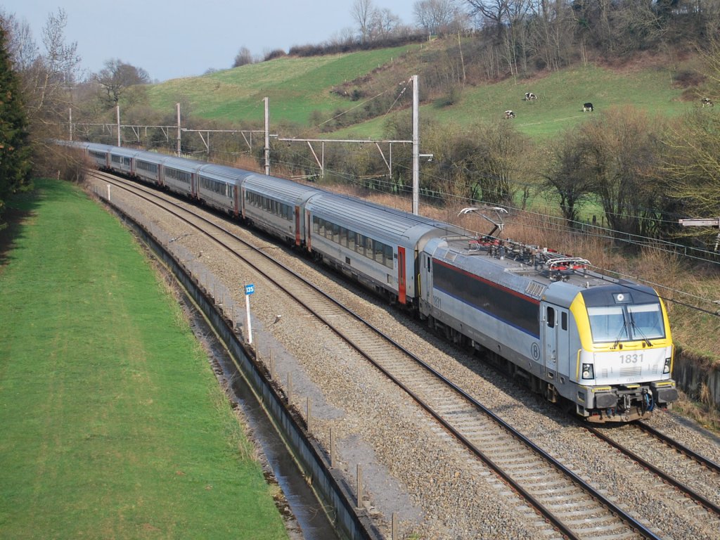 Multi-voltage engine HLE 1831 (EuroSprinter) hauling InterCity Eupen-Ostend past Baelen (20 March 2012)