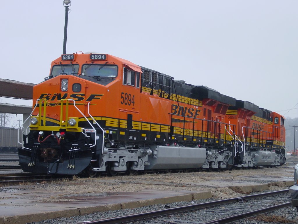 Newly delivered BNSF 5894 & 5895 sit at the Burlington, Iowa depot while its coal train is being unloaded at the power plant south of town. 9 Mar 2006