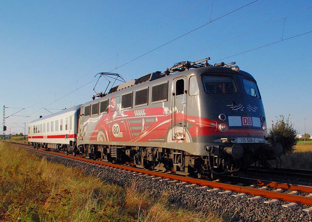 On Sunday the 9th. of septembre, I took this photo of the PbZ-train witch is pulled by the Electric locomotive of the class 115 502-9 in it's spezialcolordress. It went by with an single IC-car in the direction Cologne on the tracks of the Kbs 495  near Allerheiligen.