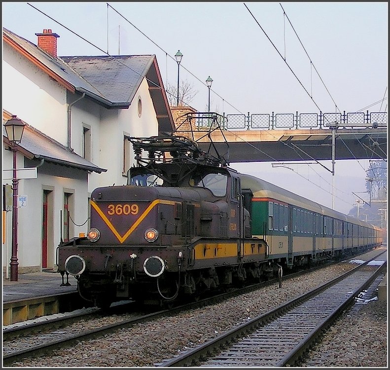 On the cold morning of March 3rd, 2004, the local train hauled by 3609 is leaving the station of Clervaux.