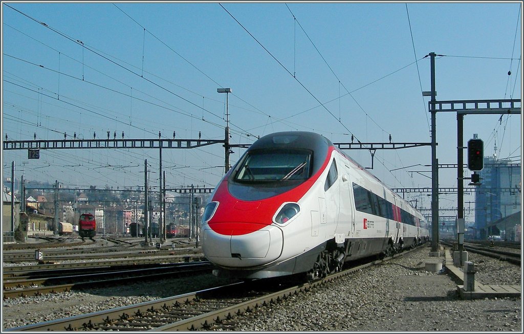 On the way from Geneva to Milan the ETR 610 here in Renens VD. 22.02.2012