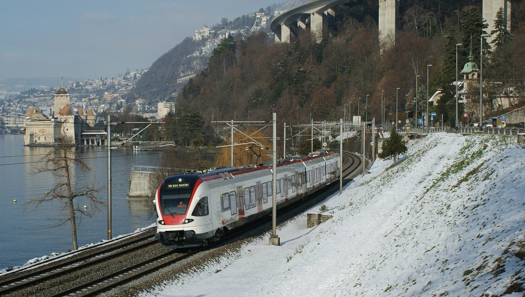 RABDe 523 022 to Villeneuve by the Castle of Chillon.
12.01.2010