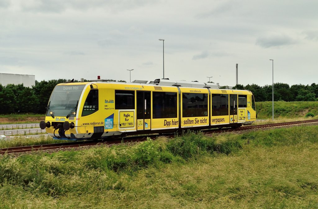 Railbus in duty....here it's near Linnich on it's way to Dren. Next station is the village of Tetz. In the back you see the industriel plant of SIG-Bloc. 22nd of june 2013
