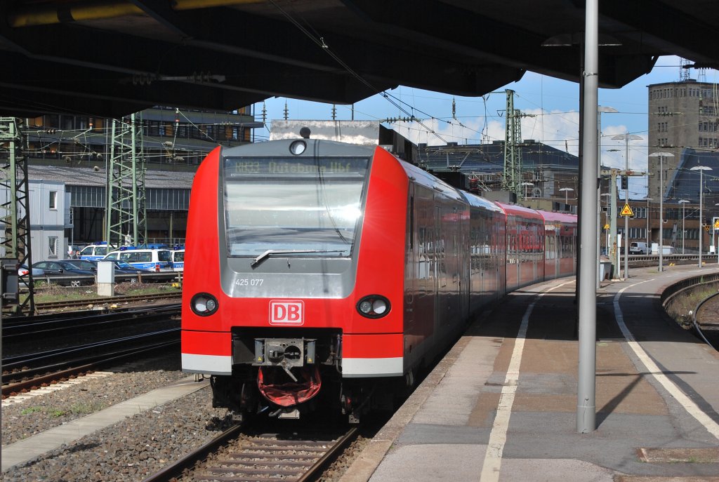 RE 33 is leaving Aachen Central Station (Hbf) towards Duisburg on 11 April 2012.
