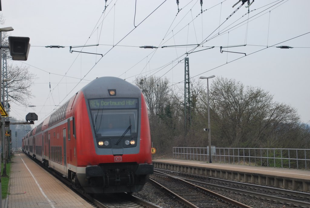 RE 4 Aachen-Dortmund passing Kohlscheid with double-decker carriages on 29 March 2012.