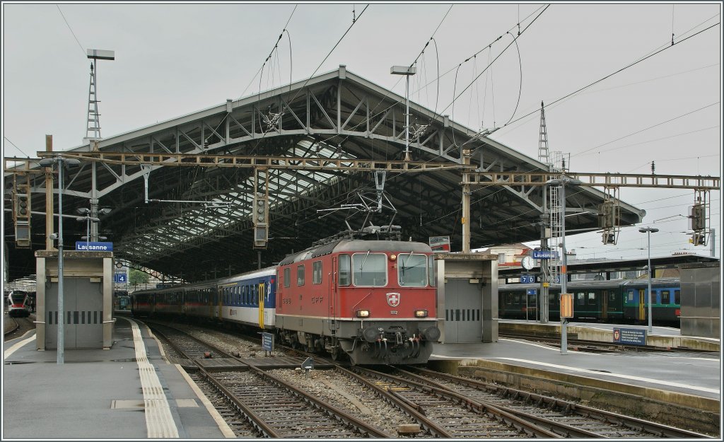  Re 4/4 II - Festival in Lausanne :
Re 4/4 II 1112 with a local train to Vallorbe is leaving Lausanne. 
12.06.2012 