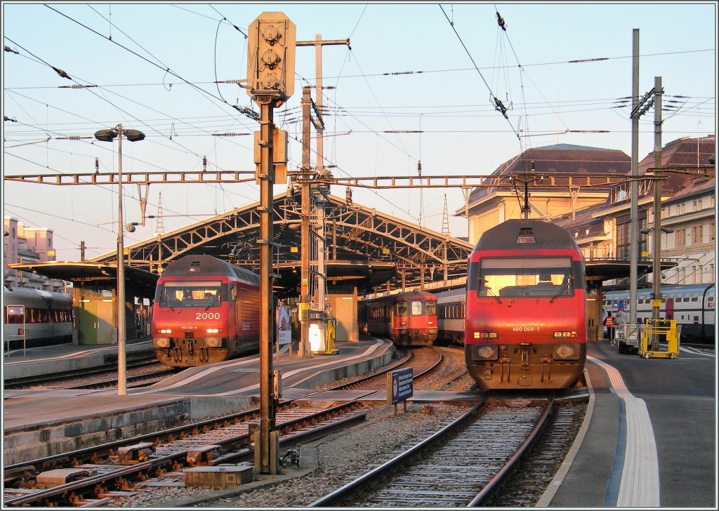 Re 460 031-8 with IR from Luzern to Geneva and Re 460 031-8 with his IR to Brig in the Lausanne Station.
10.02.2011