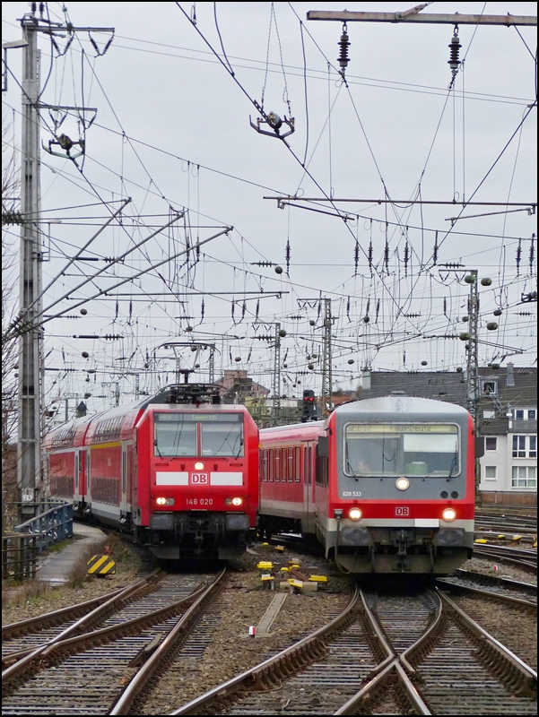 RE 5 to Emmerich and RB 38 to Köln Deutz are entering together into the main station of Cologne on December 22nd, 2012.