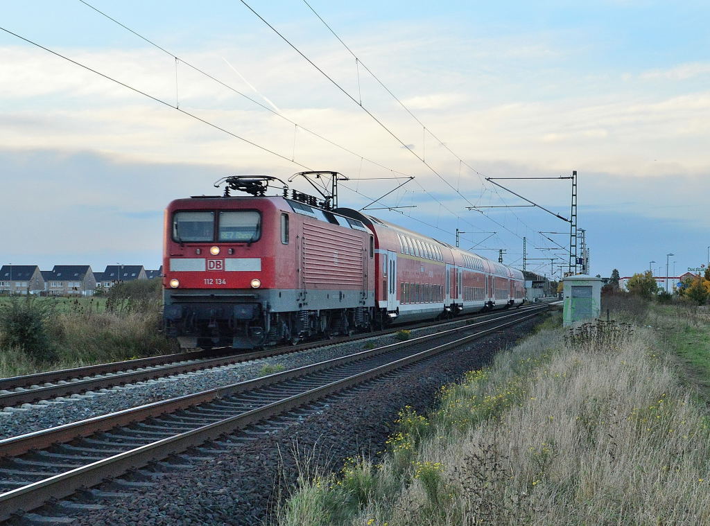 Regionale Express Train RE7 to Rheine on the tracks near Allerheiligen, the train is pulled by an class 112 locmotive from the Deutschen Bahn AG 18-10-2012