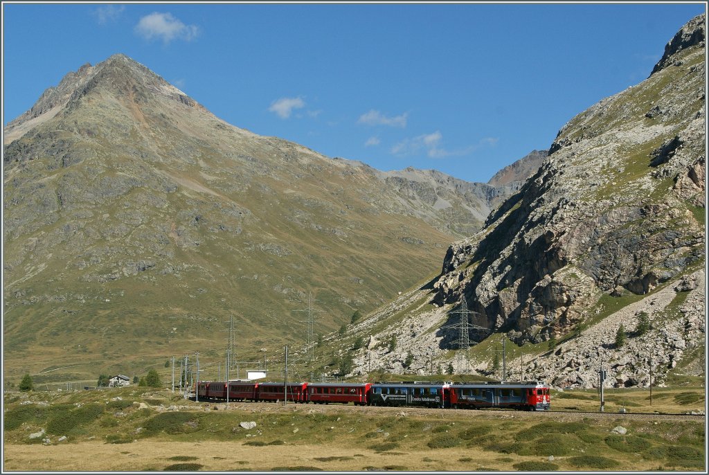 RhB Bernina local train to Tirano has leaving the Bernina Lagalb station. 
10.09.2011