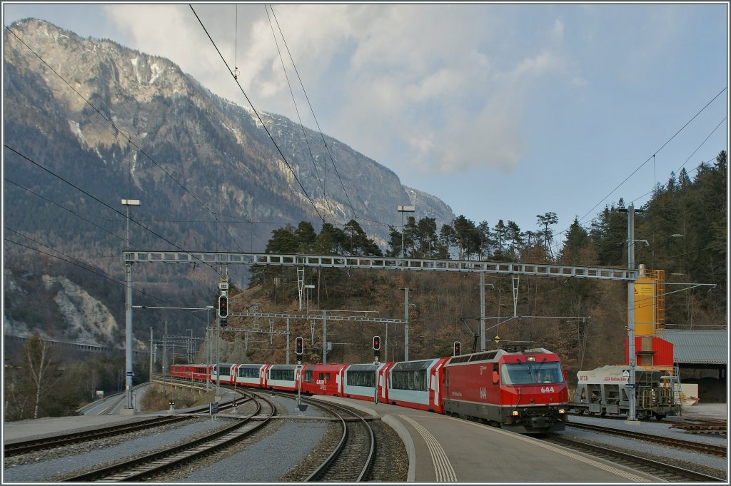 RhB Ge 4/4 III with the  Winter Glacier Express and RE on the way to St Moritz is arriving at Reichenau Tamins.
15.03.2013