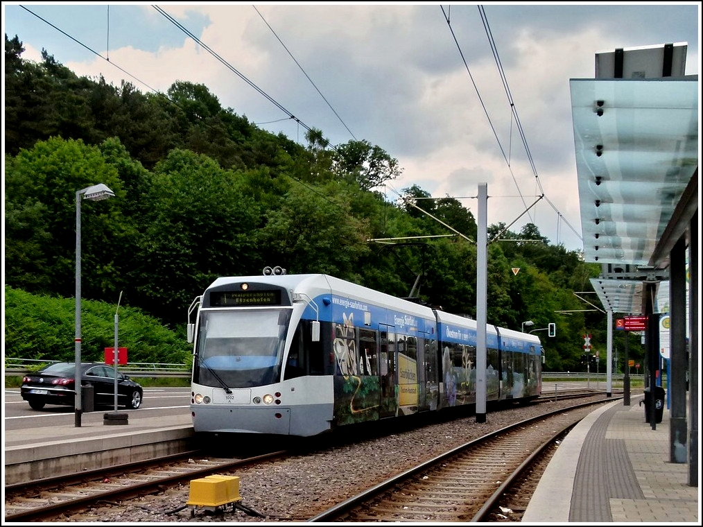 Saarbahn N° 1002 is arriving at the stop Riegelsberg Süd in Riegelsberg on May 22nd, 2011.