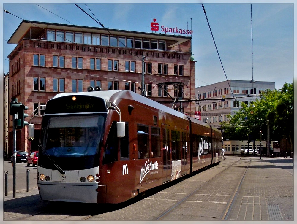 Saarbahn N 1004 is arriving at the stop Johanneskirche in Saarbrcken on May 29th, 2011.