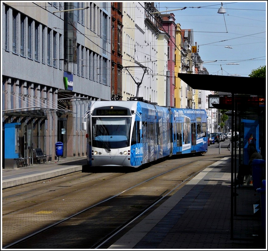 Saarbahn N 1010 is arriving at the stop Uhlandstrae in Saarbrcken on May 29th, 2011.