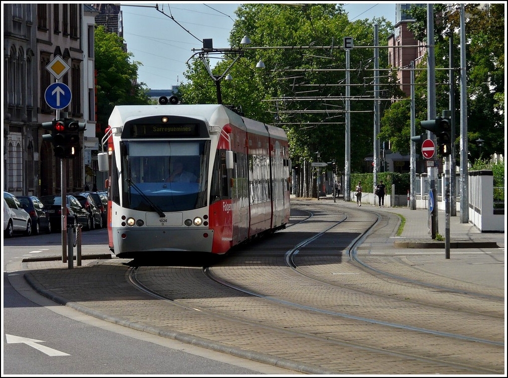 Saarbahn N° 1026 is running through the Großherzog-Friedrich-Straße in Saarbrücken on May 29th, 2011.