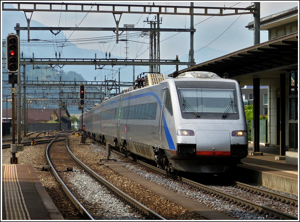 SBB ETR 470 is running without stop through the station of Erstfeld on May 24th, 2012.
