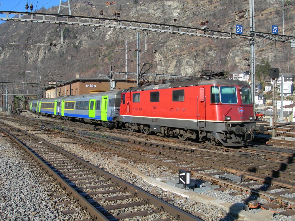 SBB Re 4/4 II with a BLS RE from Bern is arriving in Brig. 
16.02.2008