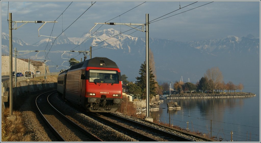 SBB Re 460 043-3 with an IR by St Saphorin. 
25.02.2012