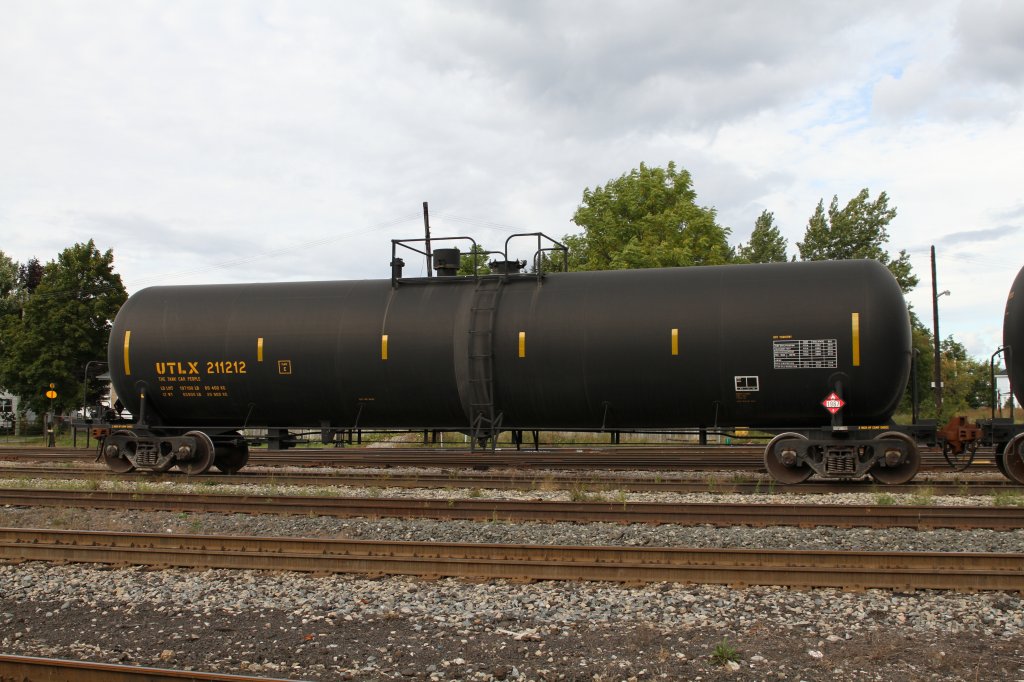 Tank car UTLX 211212 (Union Tank Car Company) at 14.09.2010 on Smith Falls, ON. This US company is specialized in leasing and repairing and prepairing of tank car.