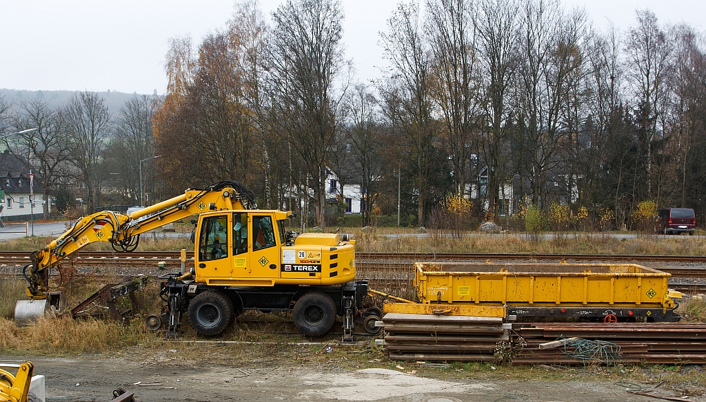 Terex (formerly Atlas) two-way excavator 1604 ZW-WB of the company H. Klostermann parked on 12.11.2011 in Burbach Wrgendorf. Listed under small car no. 97 51 06 571 60-0.