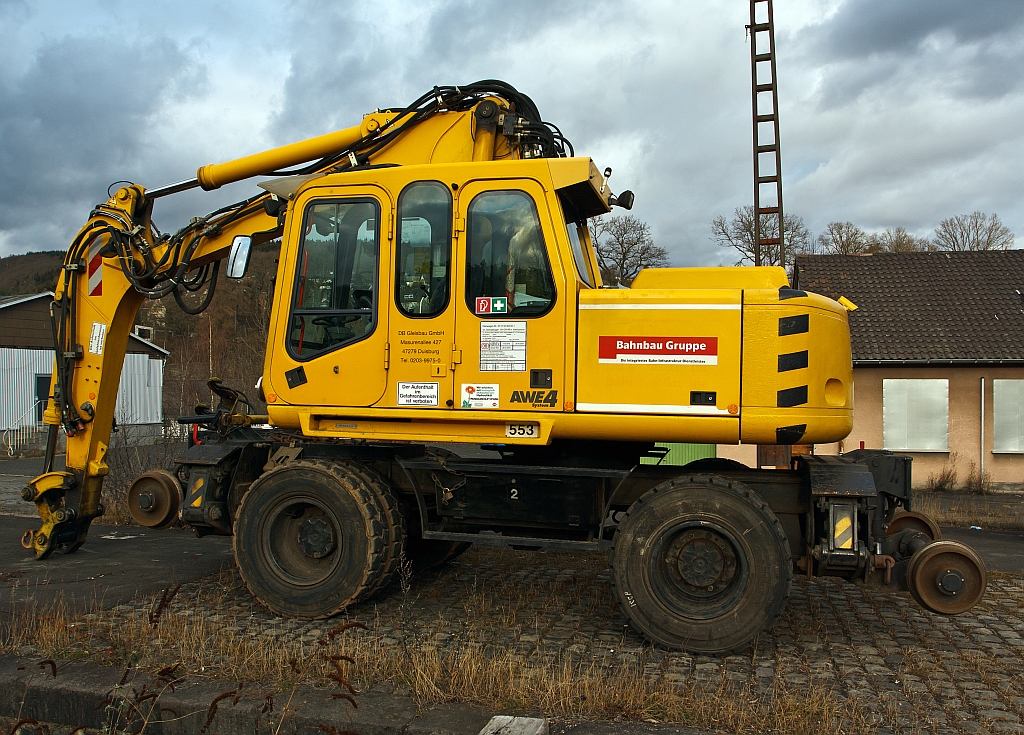 Terex (formerly Atlas) two-way excavator 1604 ZW-WB of the company Bahnbau Gruppe parked on 10.12.2011 in Betzdorf/Sieg. Listed under small car no. 97 51 92 002 60-1.