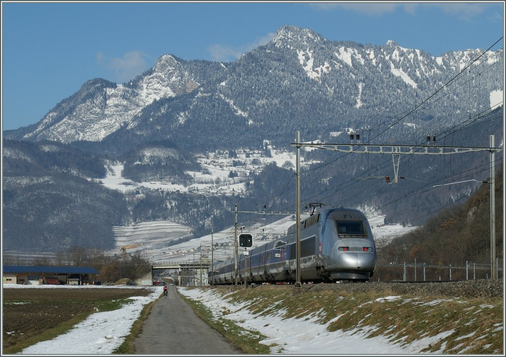 TGV Lyria 9278 from Brig to Lille (with Eurostar Connection to London) is approaching Aigle. 
