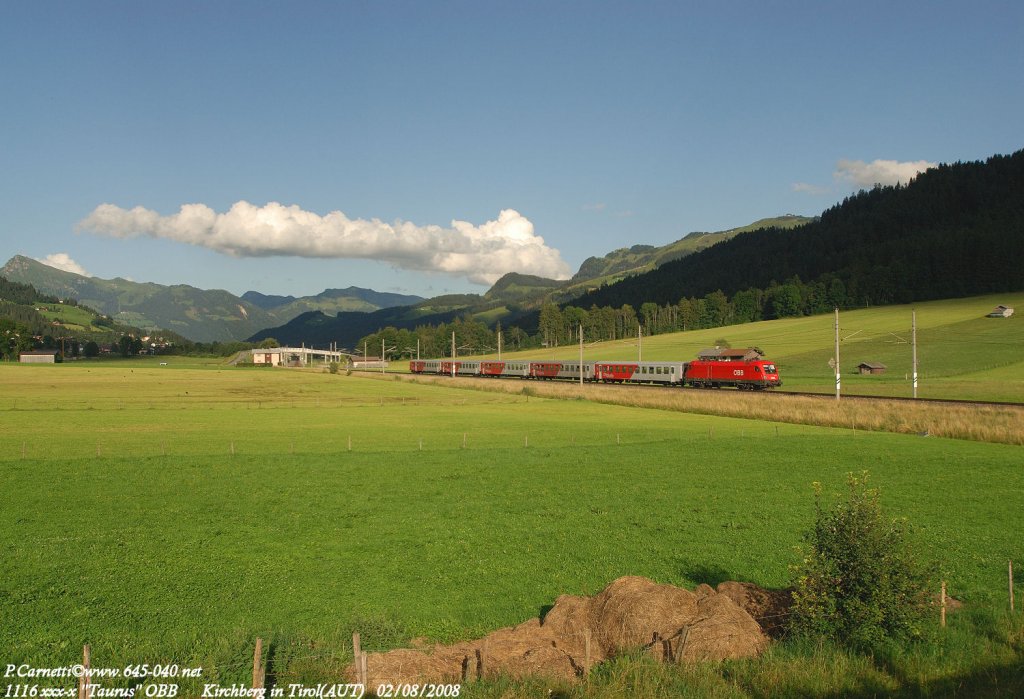 The 1116 xxx-x OBB in transit near Kirchberg in Tirol (AUT) with a REG from Worgl and direct Kizbuhel