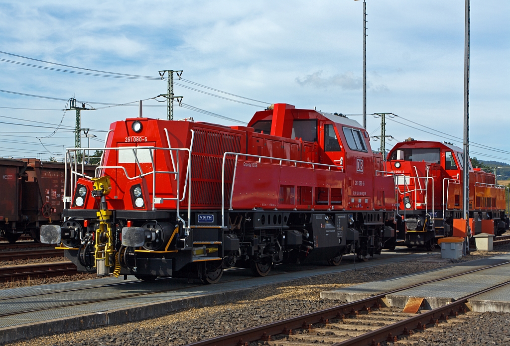 The 261 080-6 (Voith Gravita 10 BB) of the DB Schenker Rail parked on 02.09.2012 at the ICE station Montabaur. Behind this is the 261 058-2