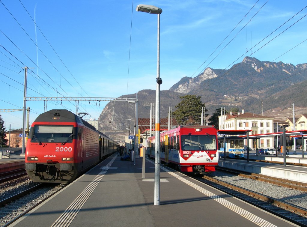 The AOMC local train to Champry waits in Aigle of voyagers from the connection IR service from Lausanne. 
08.01.2008