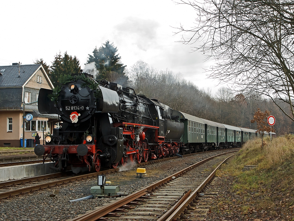 The Betzdorfer 52 8134-0 on 26.11.2011 as Santa Claus train, from Dillenburg to Wrgendorf. Here at the entrance to the station Burbach-Wrgendorf.