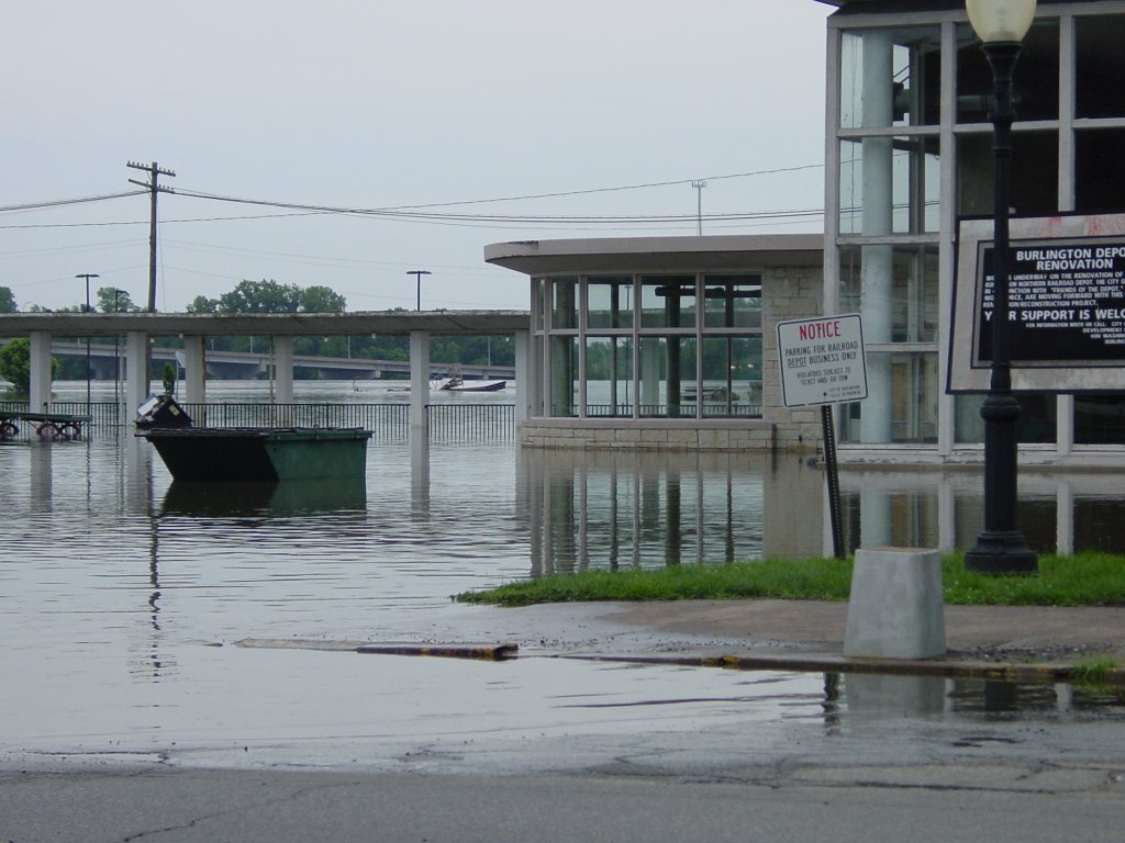 The Burlington, Iowa depot during the flood of 2008. The freight yard is completely covered with water behind the depot.