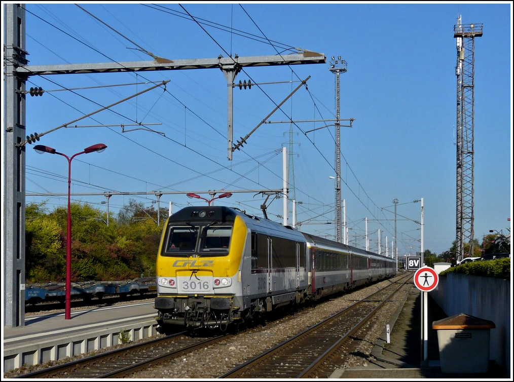 The CFL 3016 is hauling the diverted IC 90  Vauban  through the station of Rodange on October 1st, 2011. 